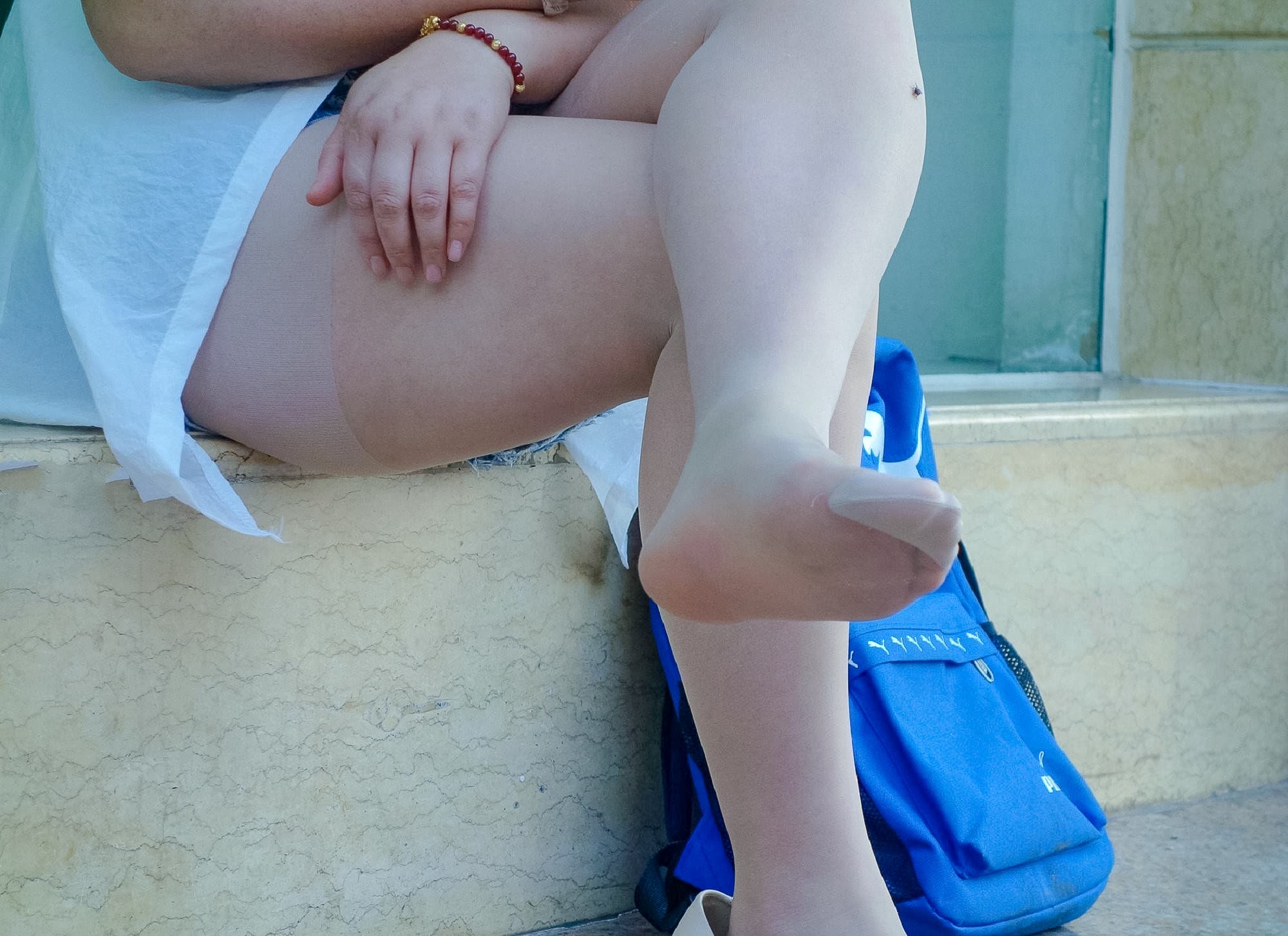 Nude pantyhose legs waiting roadside